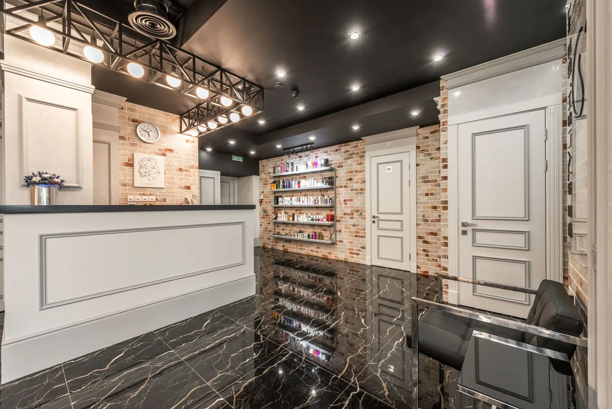 Minimalist reception counter in a beauty studio